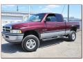 2001 Dark Garnet Red Pearl Dodge Ram 2500 SLT Quad Cab 4x4  photo #1