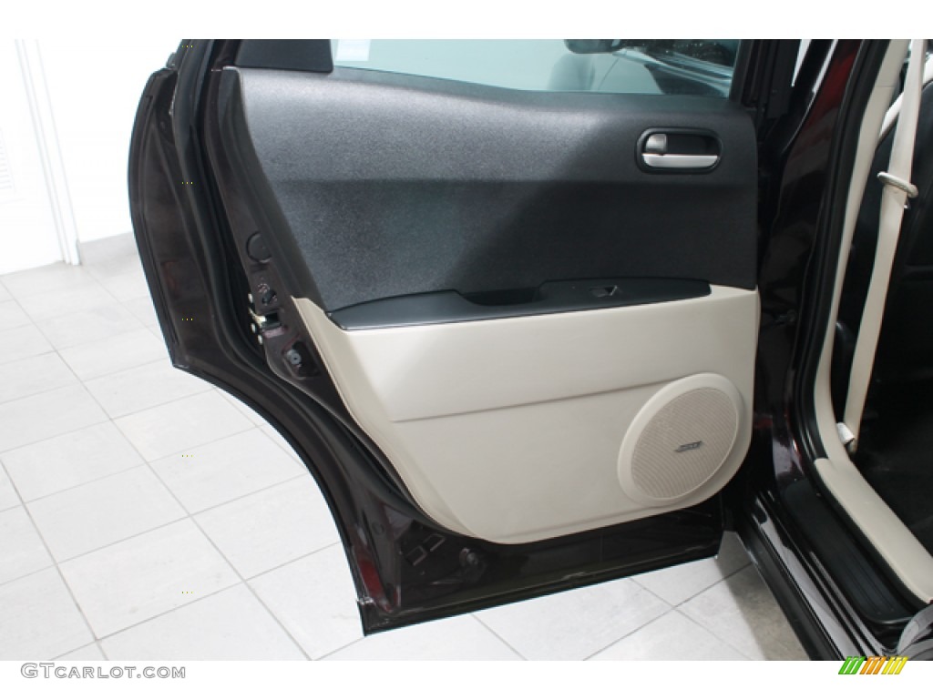 2007 Mazda CX-7 Grand Touring Sand Door Panel Photo #67794996