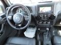 Black 2012 Jeep Wrangler Unlimited Sahara 4x4 Dashboard
