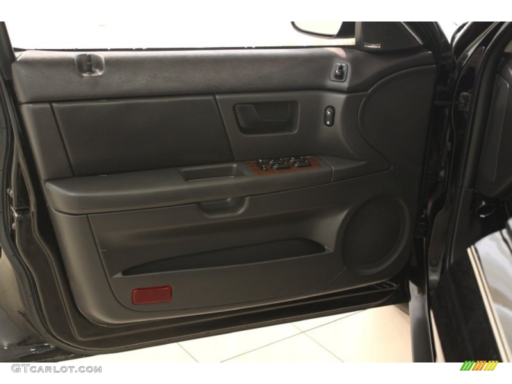 2005 Ford Taurus SEL Ebony Black Door Panel Photo #67843058