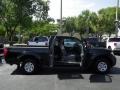 2010 Super Black Nissan Frontier XE King Cab  photo #23