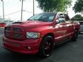 2004 Flame Red Dodge Ram 1500 SLT Sport Quad Cab  photo #9