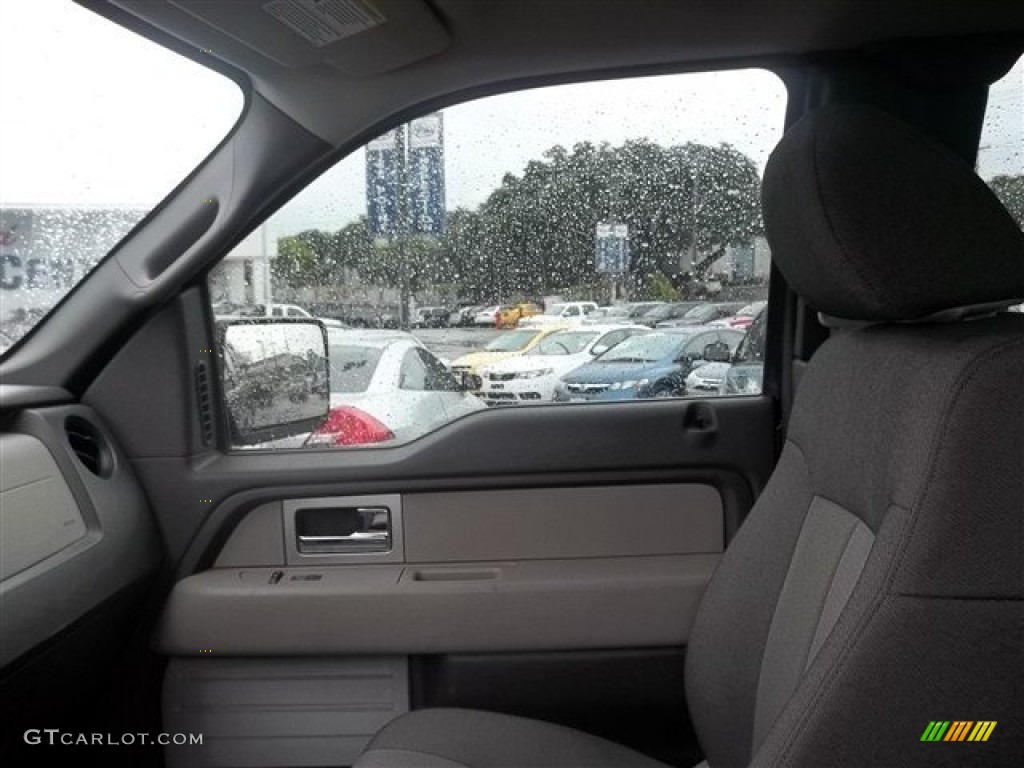 2010 F150 STX SuperCab - Tuxedo Black / Medium Stone photo #13