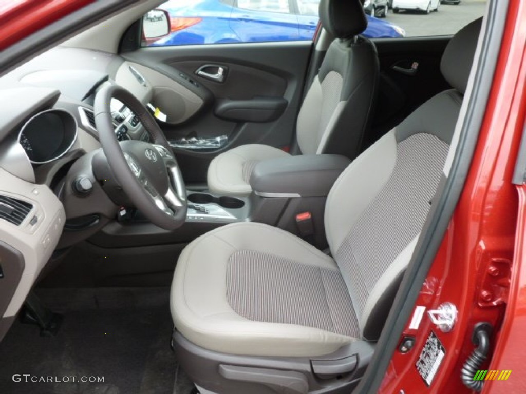 2013 Hyundai Tucson GLS Front Seat Photo #67939502