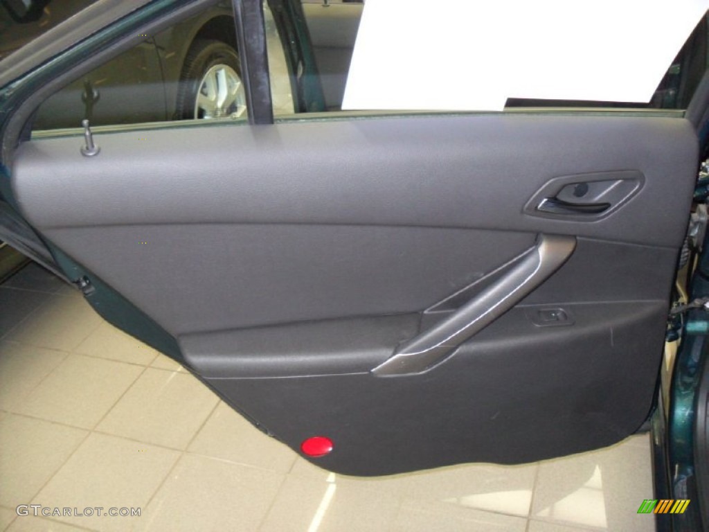 2006 Pontiac G6 V6 Sedan Ebony Door Panel Photo #67960163