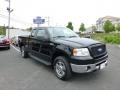 2006 Black Ford F150 XLT SuperCab 4x4  photo #1