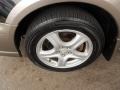 2003 Subaru Impreza Outback Sport Wagon Wheel and Tire Photo
