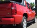 2010 Victory Red Chevrolet Avalanche LT  photo #16