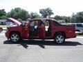 2010 Victory Red Chevrolet Avalanche LT  photo #24