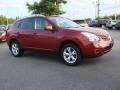 2009 Venom Red Nissan Rogue SL AWD  photo #2