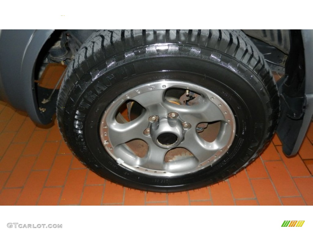 2004 Nissan Xterra SE Supercharged 4x4 Wheel Photo #67986410