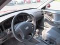 Gray 2005 Hyundai Elantra GLS Hatchback Steering Wheel