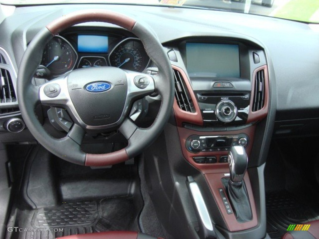 2012 Ford Focus Titanium Sedan Tuscany Red Leather Dashboard Photo #68014528