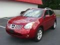 2009 Venom Red Nissan Rogue SL AWD  photo #1