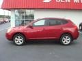 2009 Venom Red Nissan Rogue SL AWD  photo #2