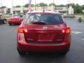 2009 Venom Red Nissan Rogue SL AWD  photo #4