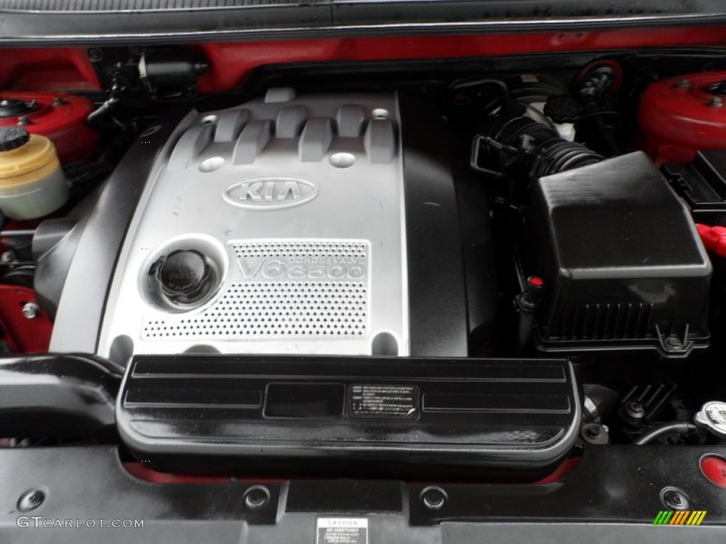 2005 Sedona LX - Ruby Red Metallic / Beige photo #20