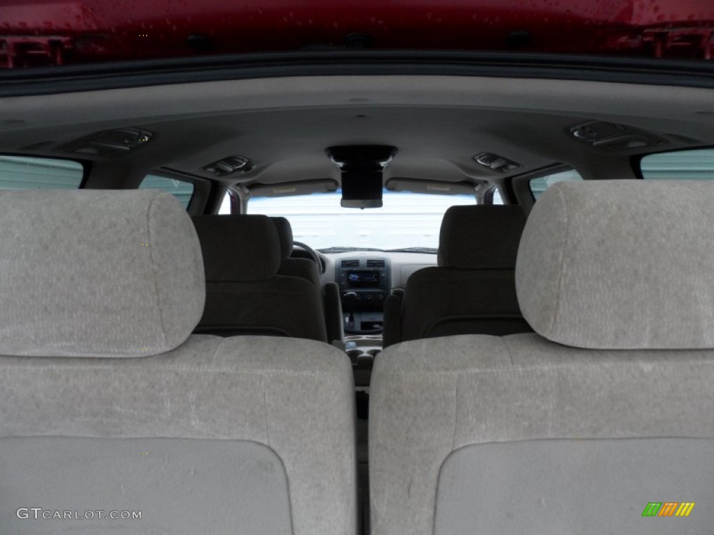2005 Sedona LX - Ruby Red Metallic / Beige photo #26