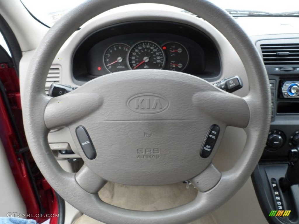 2005 Sedona LX - Ruby Red Metallic / Beige photo #37