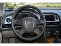 Cardamom Beige Steering Wheel Photo for 2009 Audi A6 #68034125