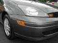 2003 Liquid Grey Metallic Ford Focus SE Sedan  photo #2