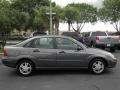 2003 Liquid Grey Metallic Ford Focus SE Sedan  photo #16