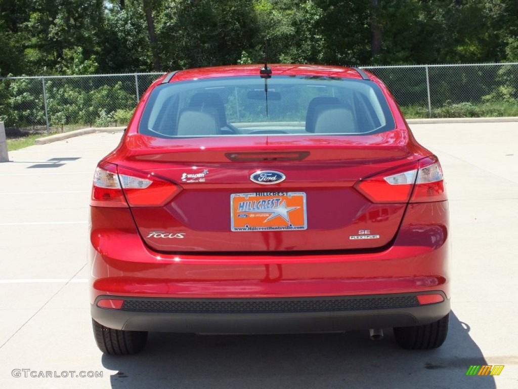 2012 Focus SE Sedan - Red Candy Metallic / Stone photo #6