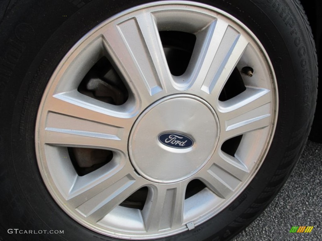2004 Ford Taurus SEL Sedan Wheel Photo #68204529