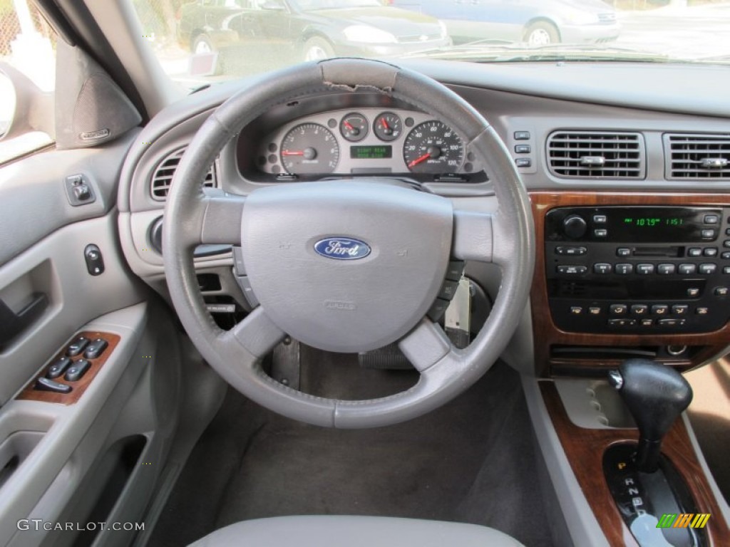 2004 Ford Taurus SEL Sedan Medium Graphite Steering Wheel Photo #68204604