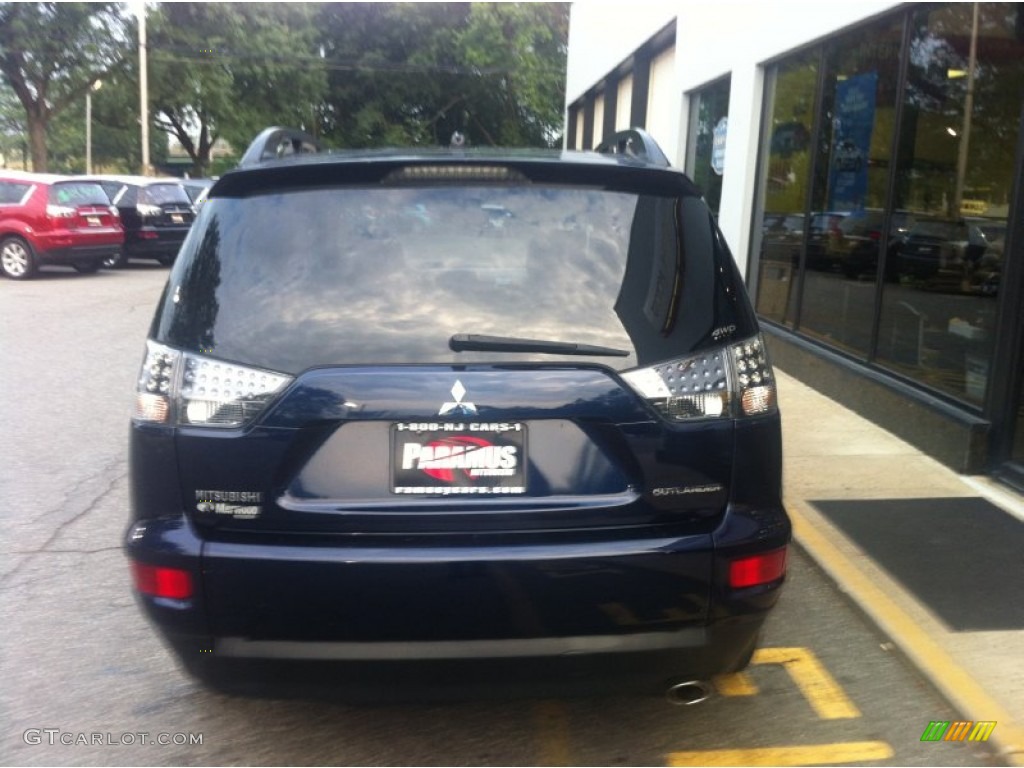 2010 Outlander SE 4WD - Cosmic Blue Metallic / Black photo #10