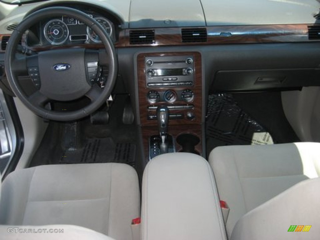 2009 Taurus SE AWD - Brilliant Silver Metallic / Medium Light Stone photo #7