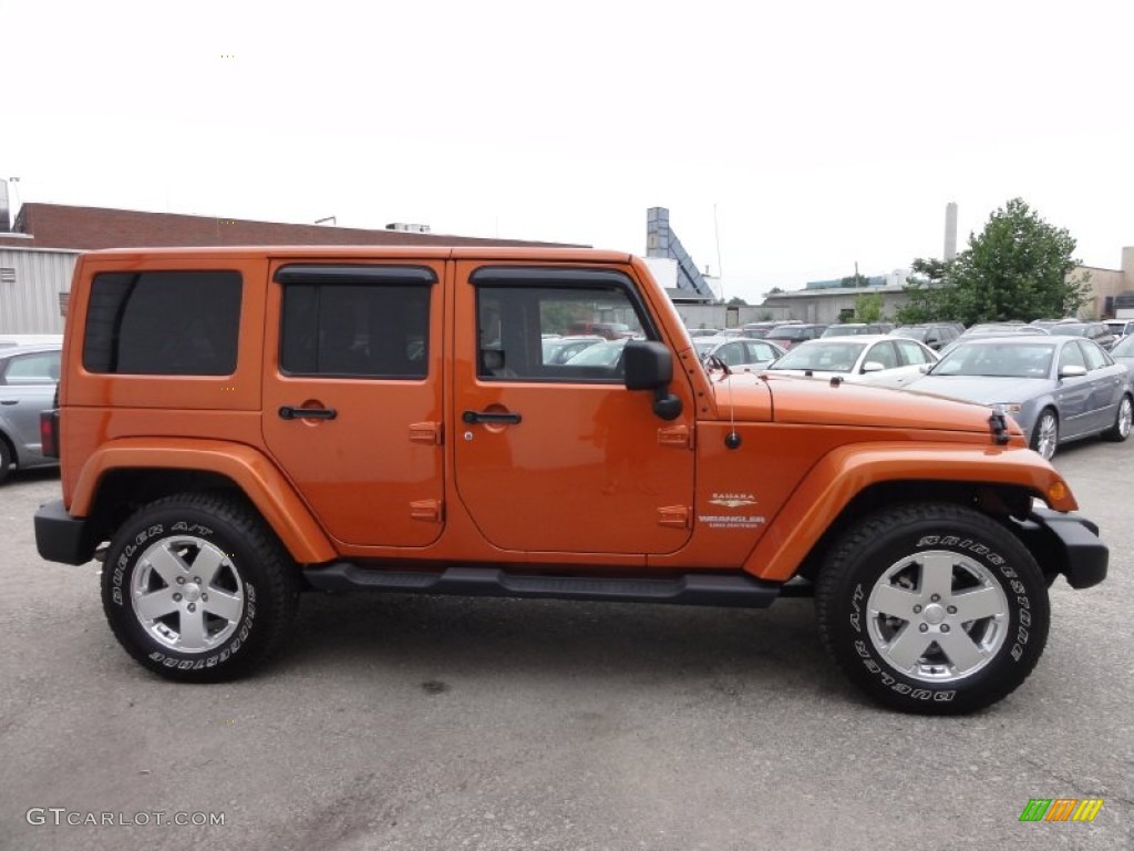 Mango Tango Pearl 2011 Jeep Wrangler Unlimited Sahara 4x4 Exterior Photo #68269202