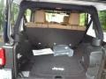 2012 Jeep Wrangler Unlimited Black/Dark Saddle Interior Trunk Photo