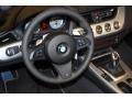 Black 2011 BMW Z4 sDrive35is Roadster Steering Wheel