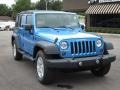 2010 Surf Blue Pearl Jeep Wrangler Unlimited Sport  photo #4