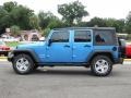 2010 Surf Blue Pearl Jeep Wrangler Unlimited Sport  photo #11