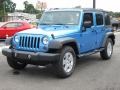 2010 Surf Blue Pearl Jeep Wrangler Unlimited Sport  photo #13