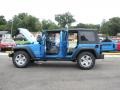 2010 Surf Blue Pearl Jeep Wrangler Unlimited Sport  photo #24