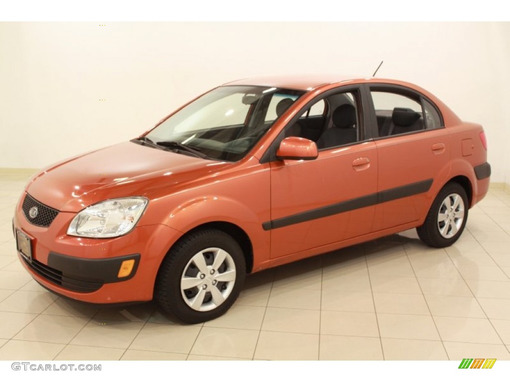 Sunset Orange 2009 Kia Rio LX Sedan Exterior Photo #68295965