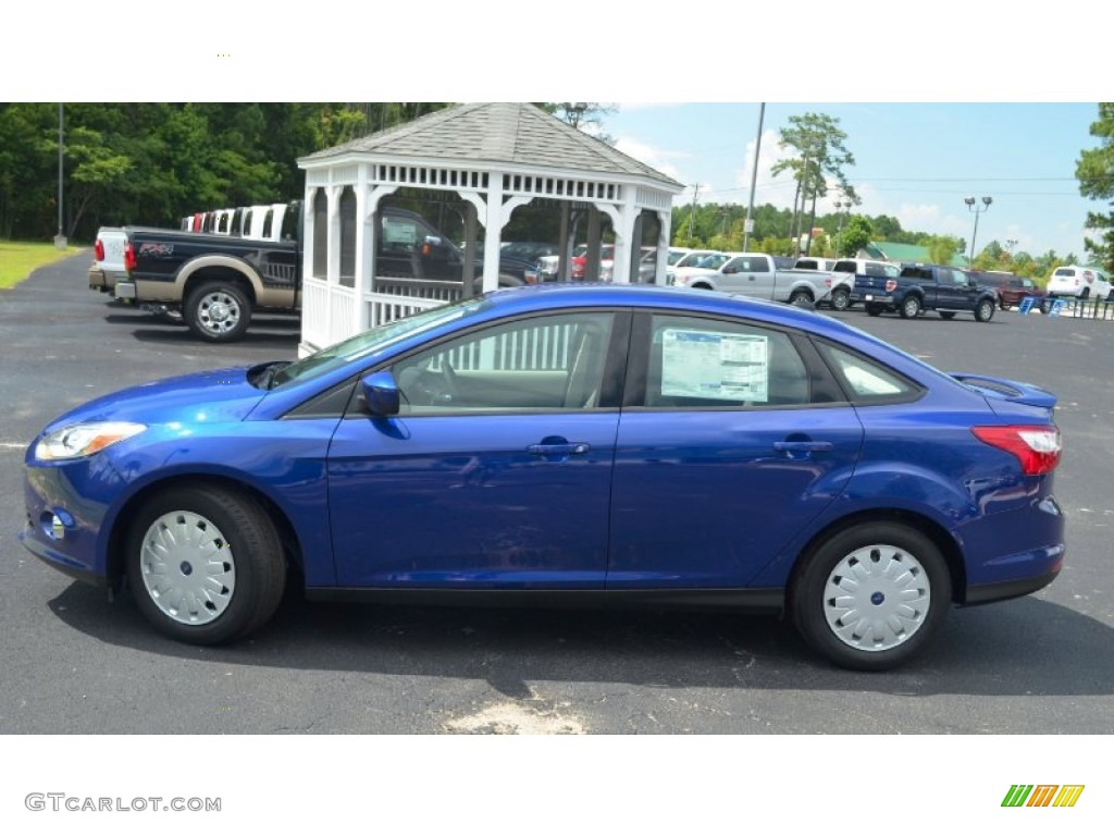 2012 Focus SE Sedan - Blue Candy Metallic / Stone photo #8
