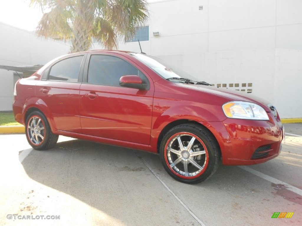 2010 Aveo LT Sedan - Sport Red / Charcoal photo #1
