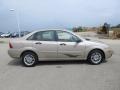 Pueblo Gold Metallic 2006 Ford Focus ZX4 SE Sedan Exterior