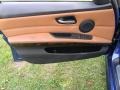 Saddle Brown Dakota Leather Door Panel Photo for 2011 BMW 3 Series #68373699