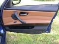 Saddle Brown Dakota Leather Door Panel Photo for 2011 BMW 3 Series #68373726