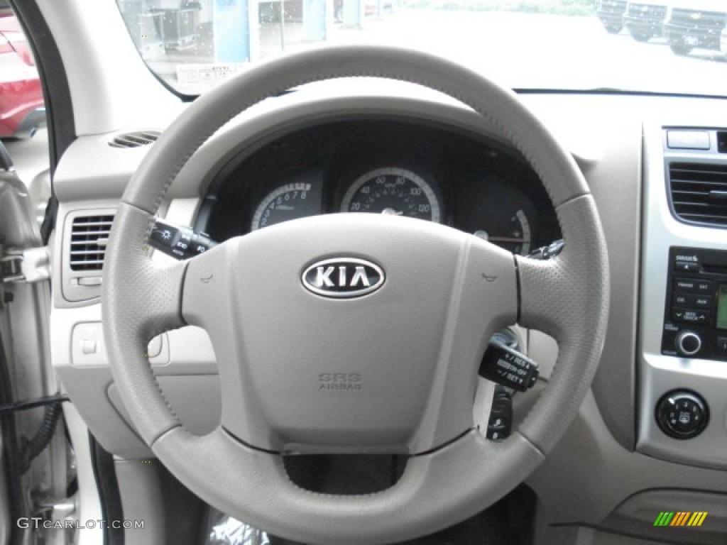 2009 Kia Sportage EX V6 4x4 Beige Steering Wheel Photo #68379291