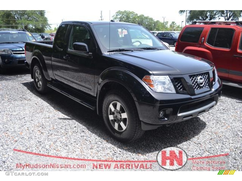 2010 Frontier SE V6 King Cab 4x4 - Super Black / Graphite/Red photo #1