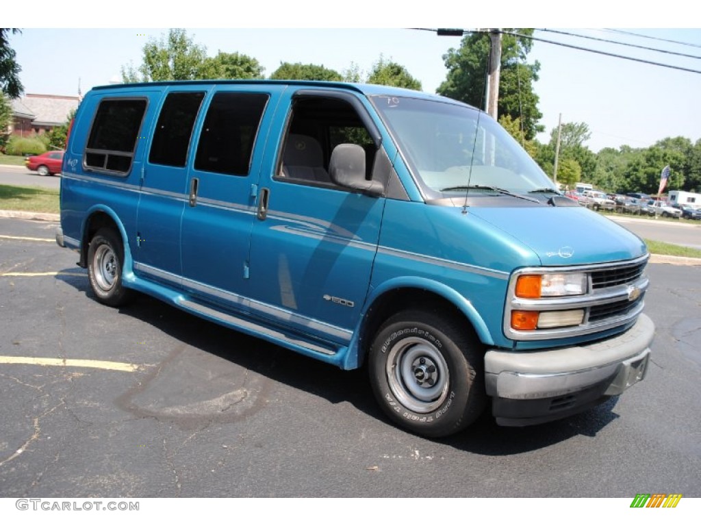 Medium Fernmist Green Metallic 1999 Chevrolet Express 1500 Passenger Conversion Van Exterior Photo #68409797