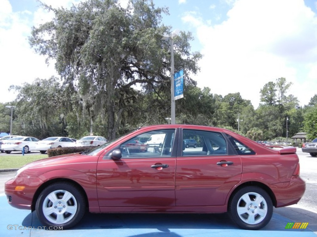 2005 Focus ZX4 SES Sedan - Sangria Red Metallic / Dark Flint/Light Flint photo #2