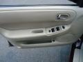 2001 Mazda 626 Beige Interior Door Panel Photo