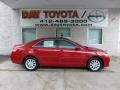 2010 Barcelona Red Metallic Toyota Camry XLE V6  photo #1